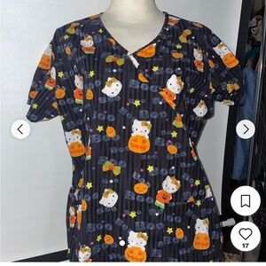Hello Kitty Sanrio Official Halloween Scrub Top, front pockets, cinch waist.
